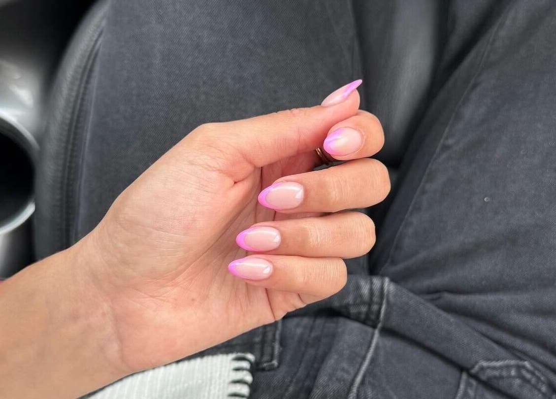 Elegant pink French manicure from The Room, Pretoria, Gauteng, ZA, showcasing stylish nail art.
