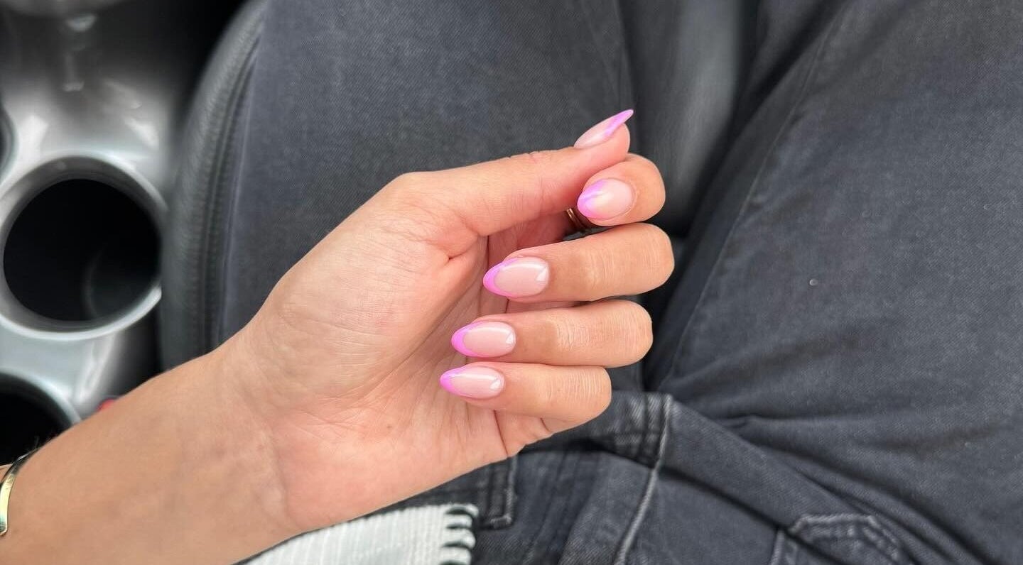 Elegant pink French manicure from The Room, Pretoria, Gauteng, ZA, showcasing stylish nail art.