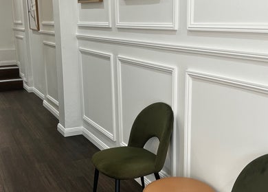 Elegant hallway with stylish chairs at Brown Sugar Rozelle, Rozelle, New South Wales, AU.