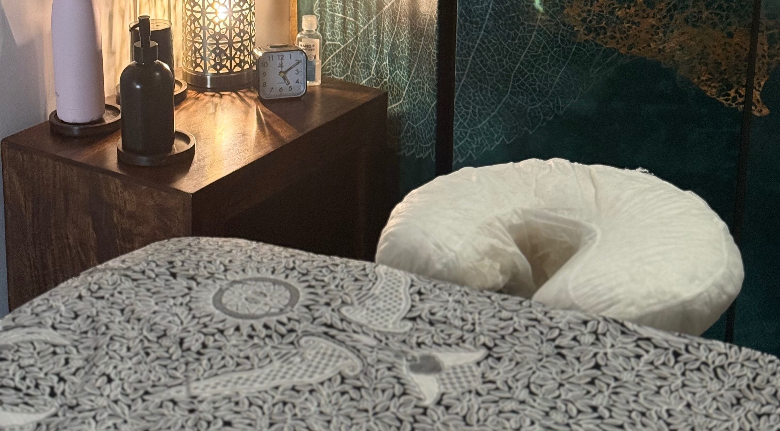 Relaxing massage room at Indigo Massage inside 3M Fitness, Nettlestead, GB with elegant decor and soft lighting.