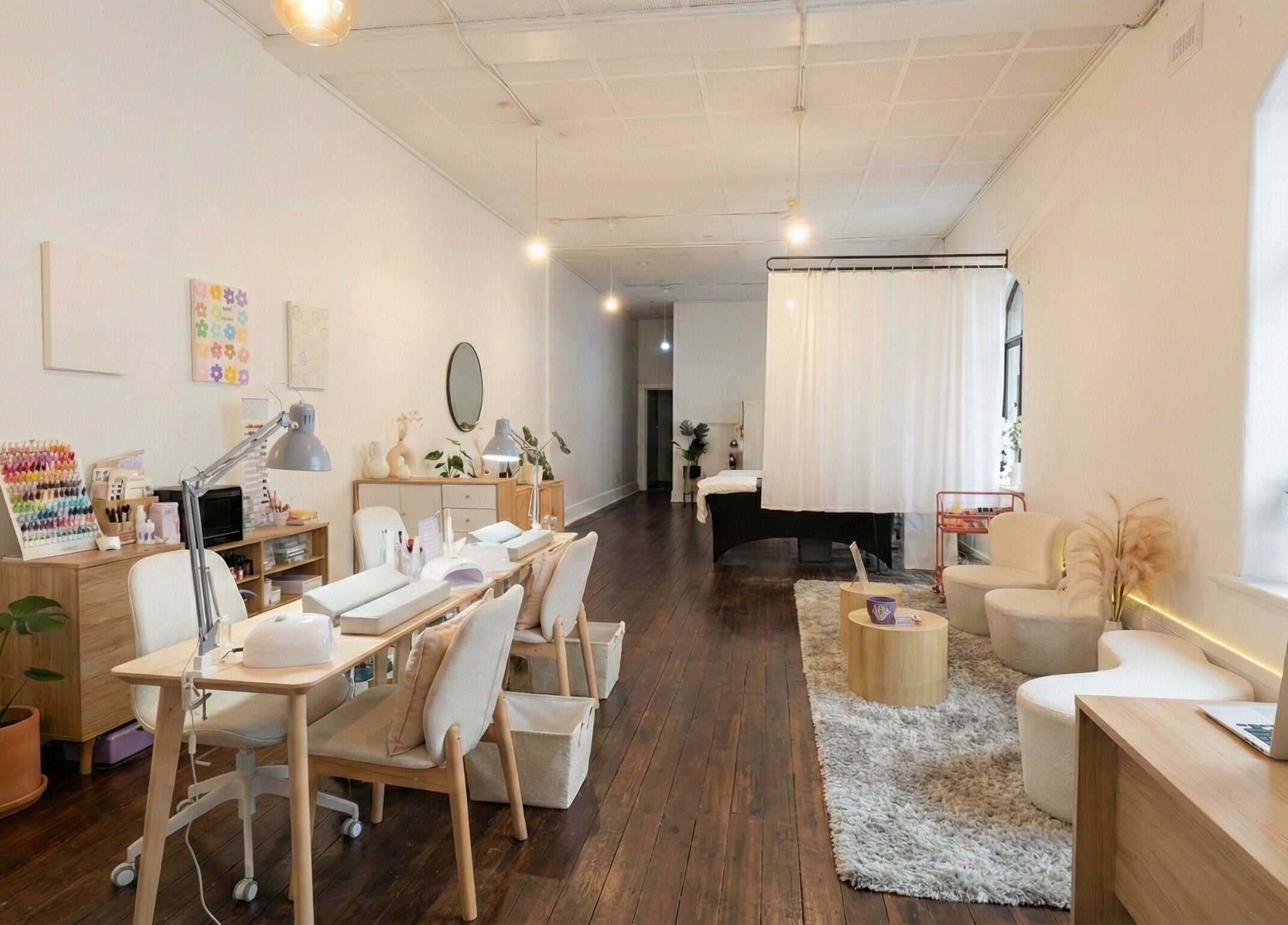 Modern interior of Wonderbu Nails in Melbourne, Victoria, AU, featuring stylish decor and comfortable seating.