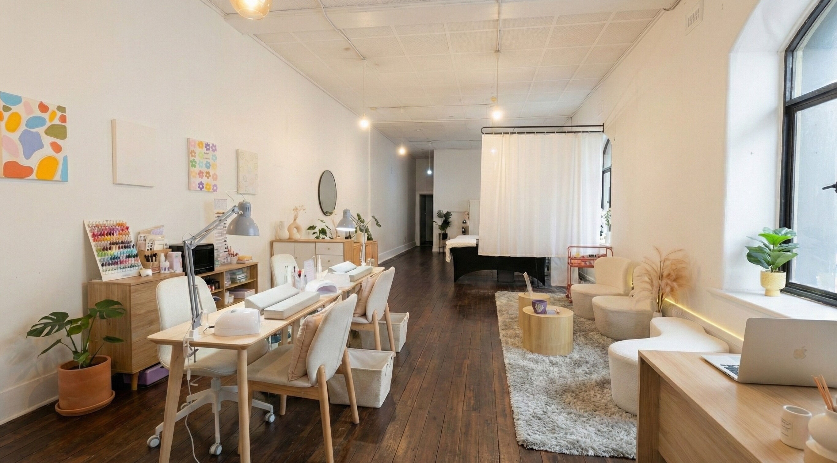 Modern interior of Wonderbu Nails in Melbourne, Victoria, AU, featuring stylish decor and comfortable seating.