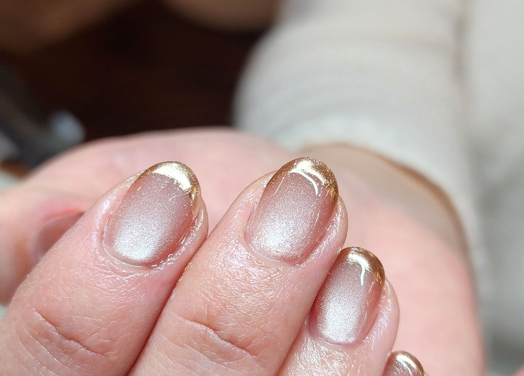 Stylish gold-tipped nails at Wonderbu Nails, Melbourne, Victoria, AU.