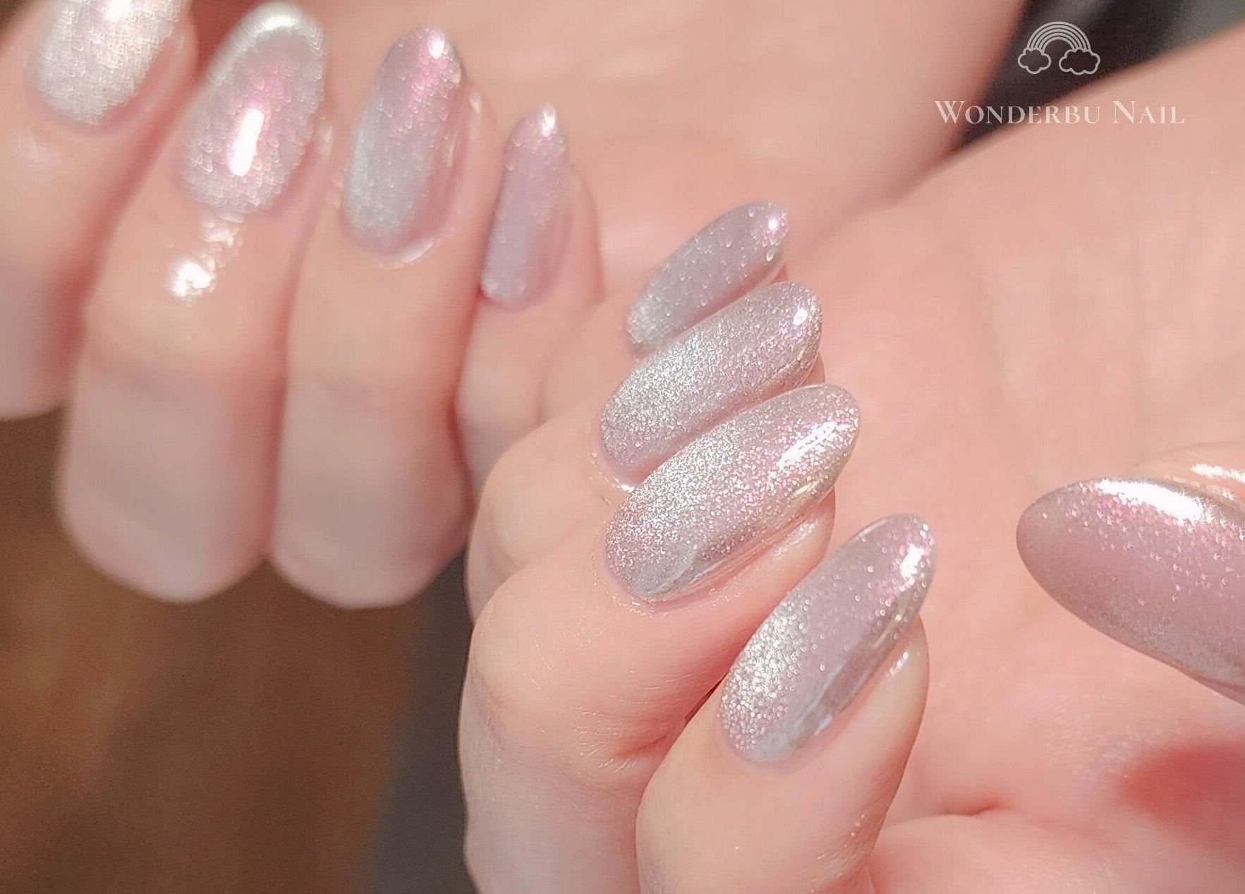 Elegant silver glitter nails at Wonderbu Nails, Melbourne, Victoria, AU