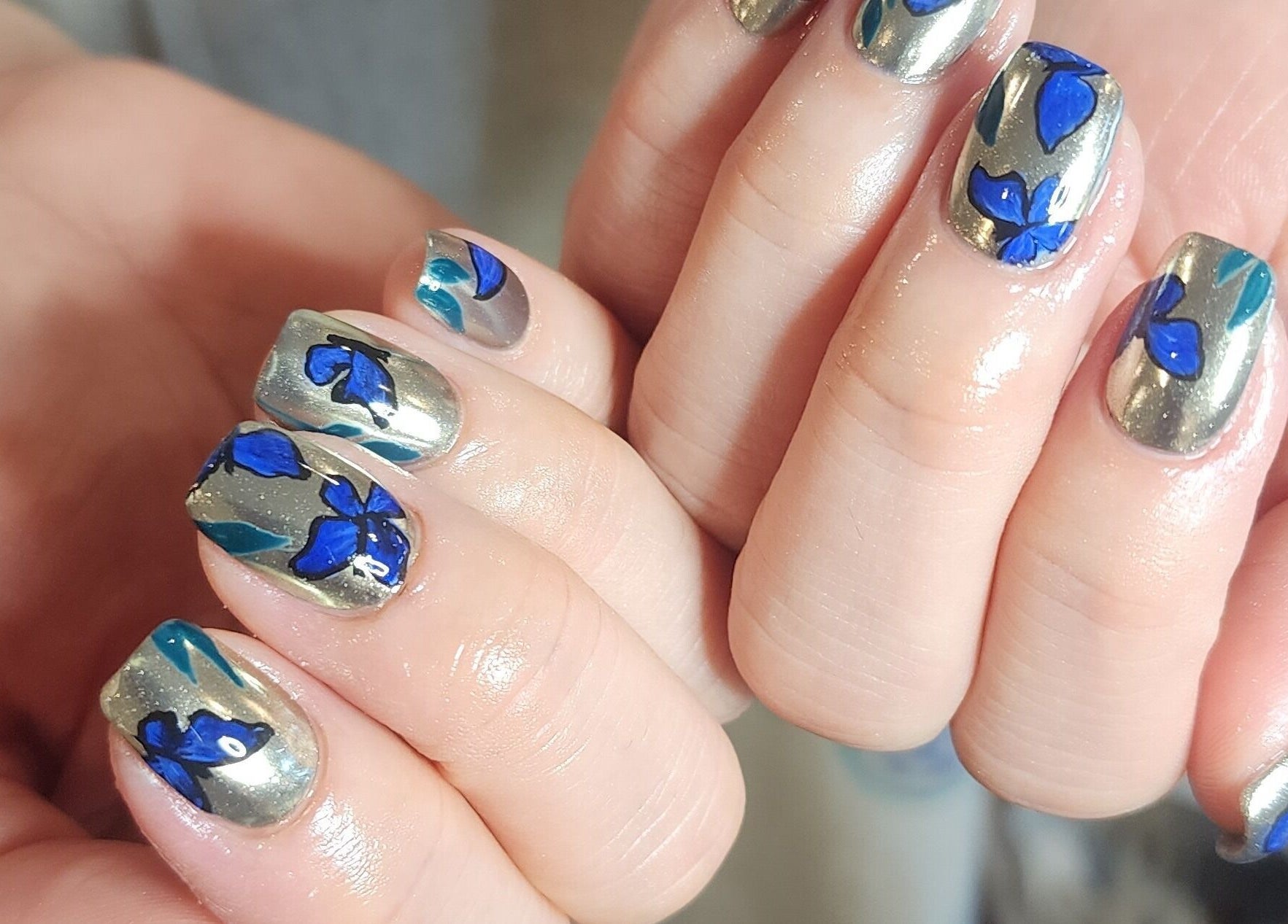 Intricate blue floral nail art by Wonderbu Nails, Melbourne, Victoria, AU.