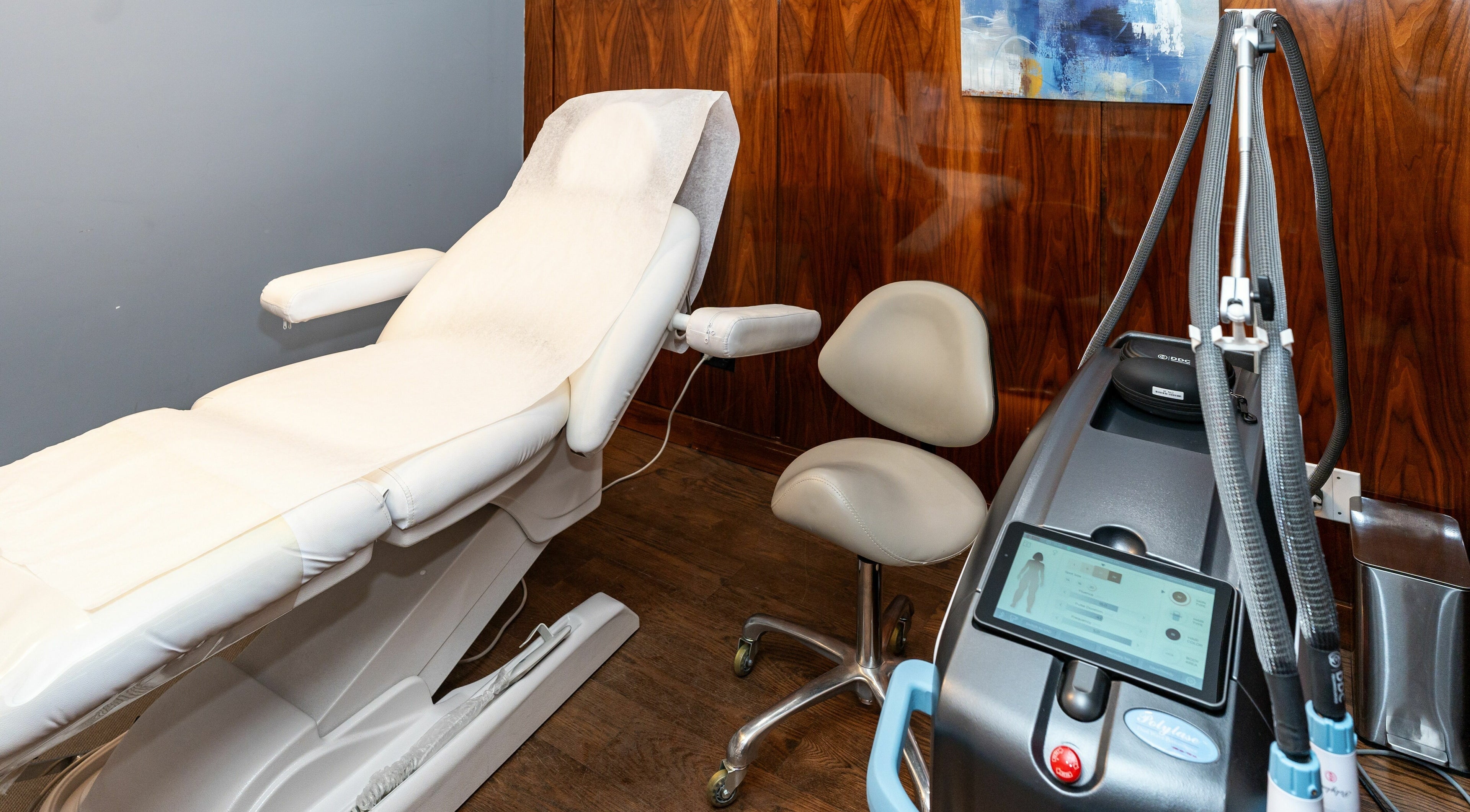 Luxurious treatment room at W Laser Inc, New York, New York, US, featuring a modern massage chair.