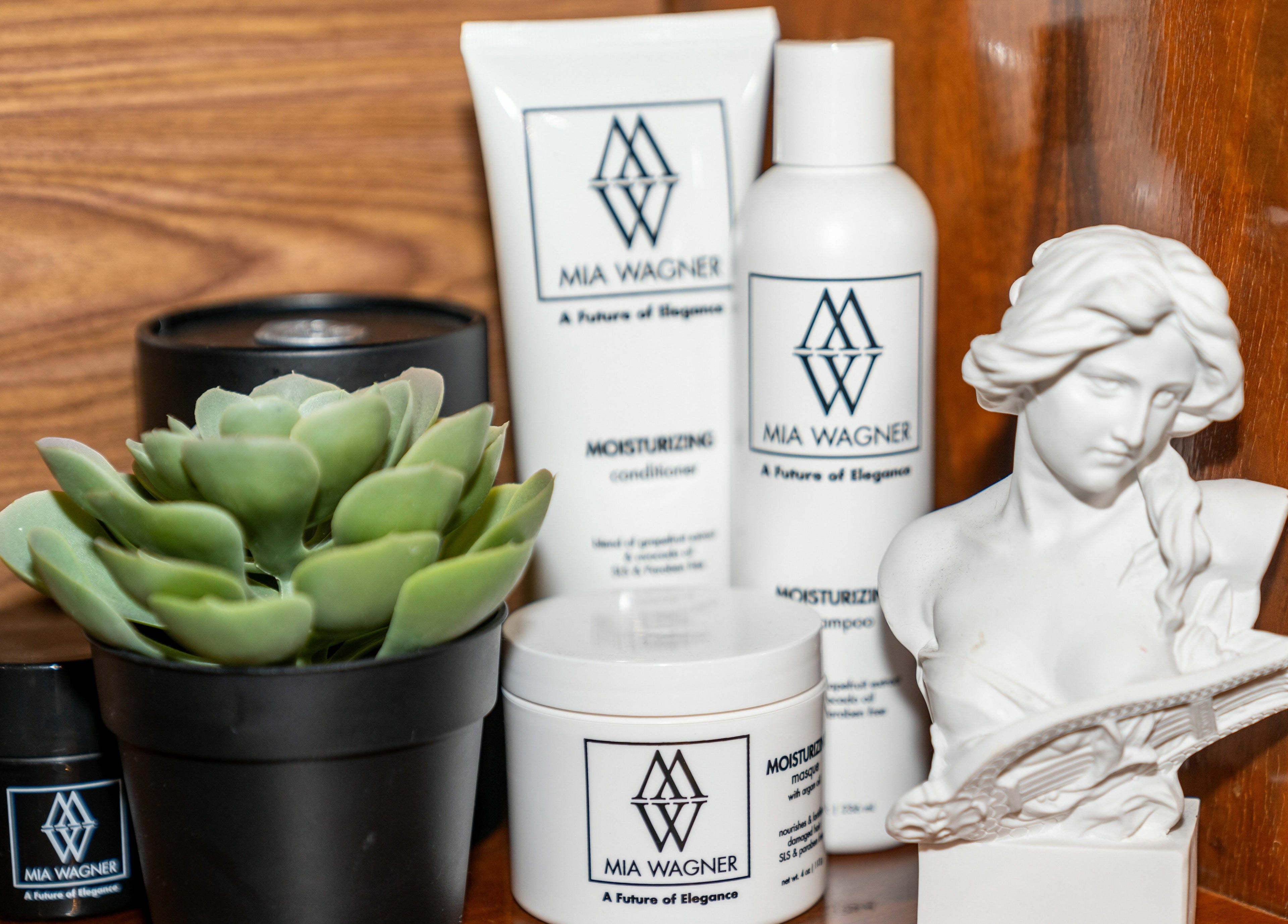 Beauty products and statue at W Laser Inc, New York, New York, US, enhancing serene elegance.