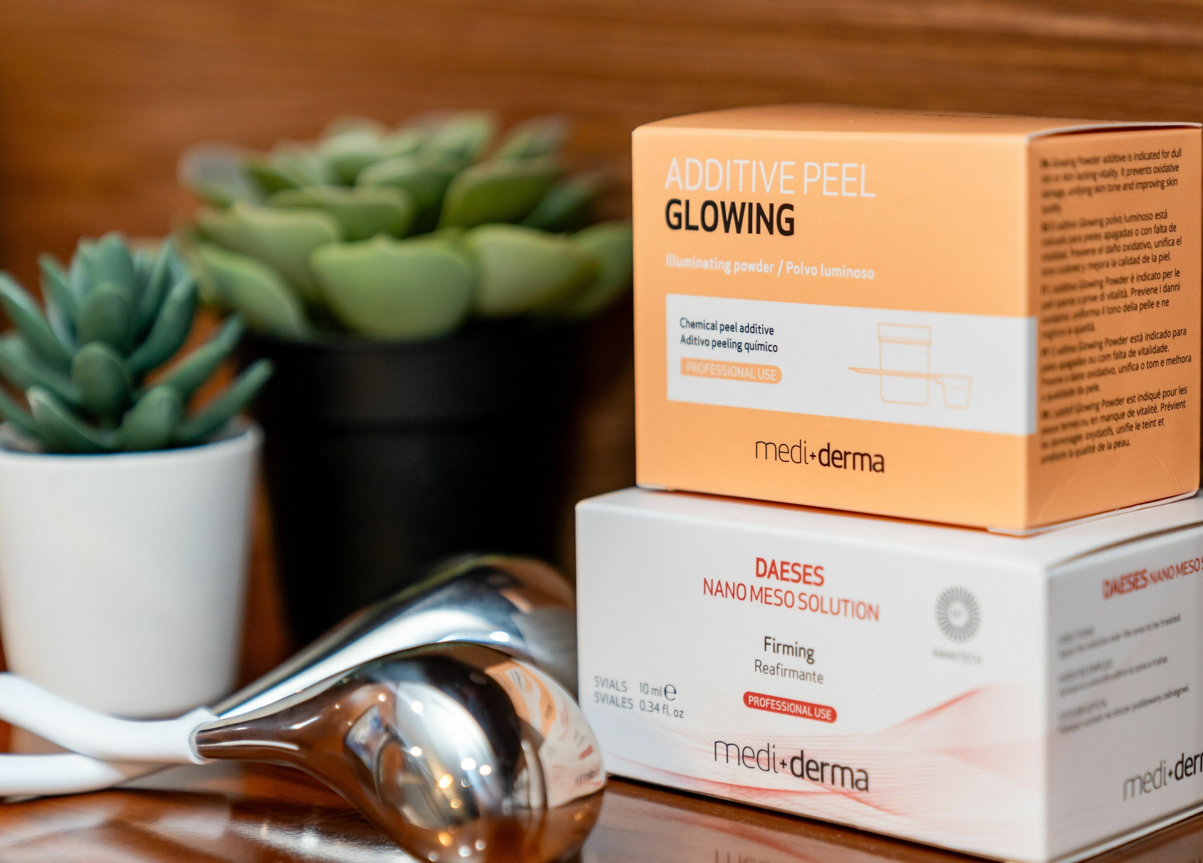 Skincare products at W Laser Inc, New York, US featuring Medi-Derma solutions and succulents.