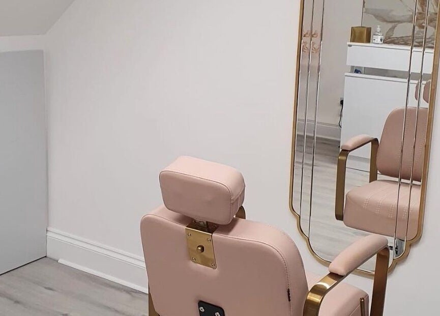 Elegant salon chair facing a stylish mirror at Darlalash, Kettering, England, GB.