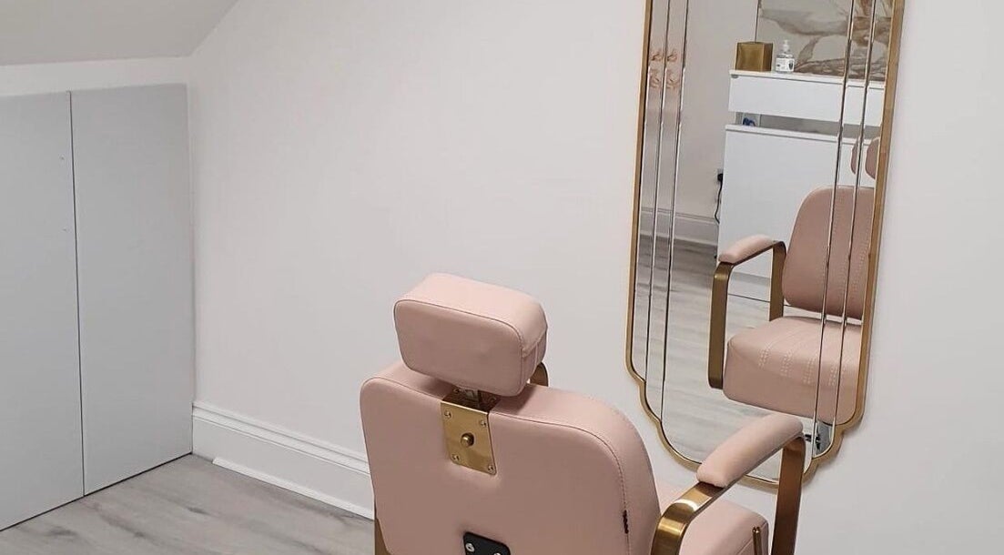 Elegant salon chair facing a stylish mirror at Darlalash, Kettering, England, GB.