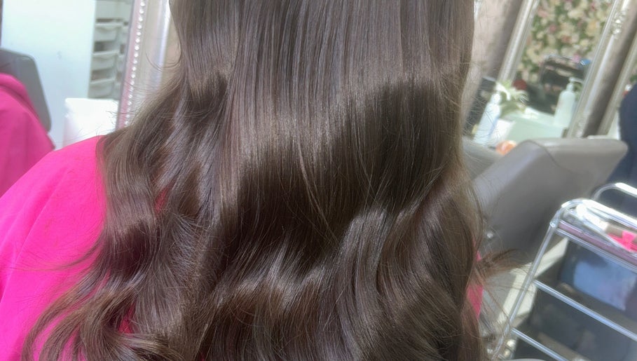 Glossy, styled brown hair at Hair by Emma, Motherwell, Scotland, GB salon.