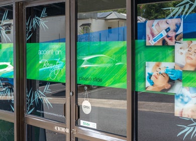 Justine's Accent on Beauty storefront entrance in Mudgeeraba, Queensland, AU showcasing facial treatments.