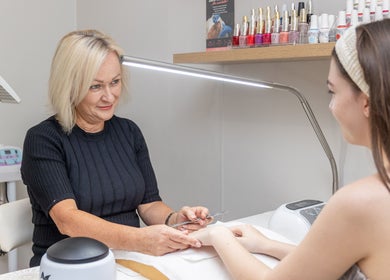 Manicure session at Justine's Accent on Beauty, Mudgeeraba, Queensland, AU, showcasing expert nail care.