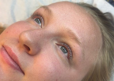 Close-up of a relaxed woman receiving skincare at Chlos Beauty Corner, Callington, England, GB.