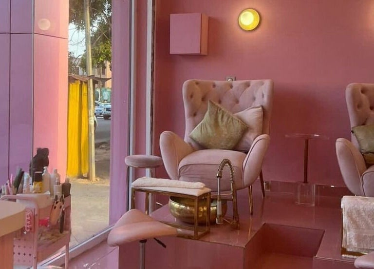 Luxurious pink spa chairs at Lynette's, Accra, Greater Accra Region, GH, set in a serene, inviting atmosphere.