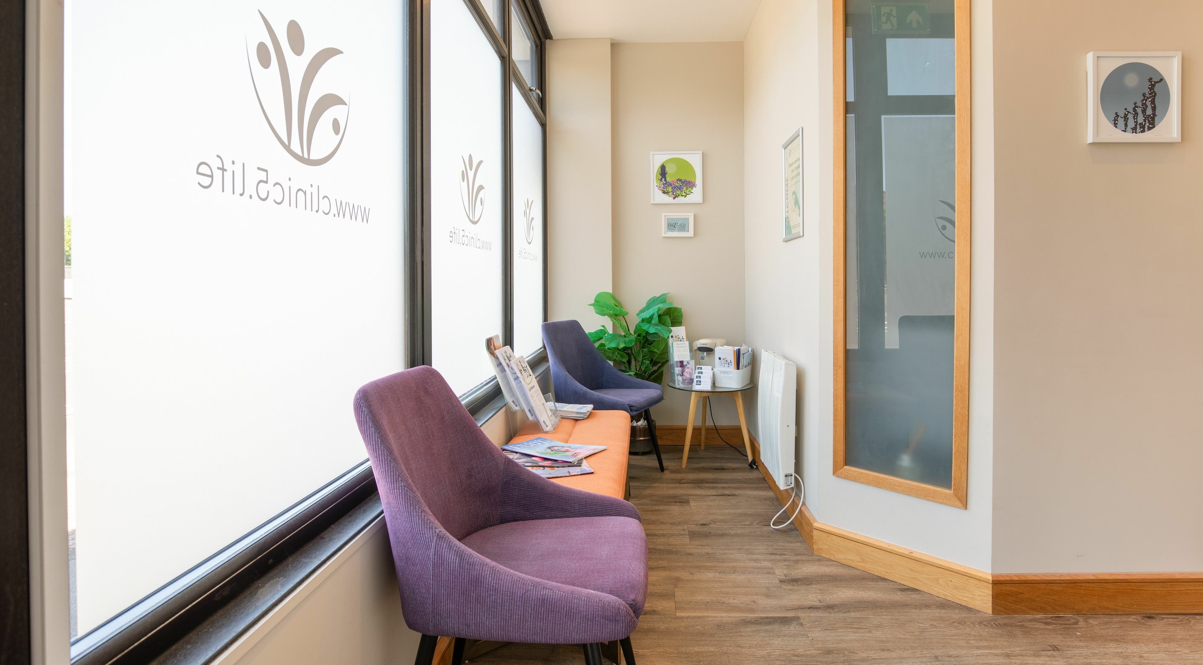 Relaxing lounge area at Frontalis Clinic, Portishead, England, GB with stylish chairs and decor.