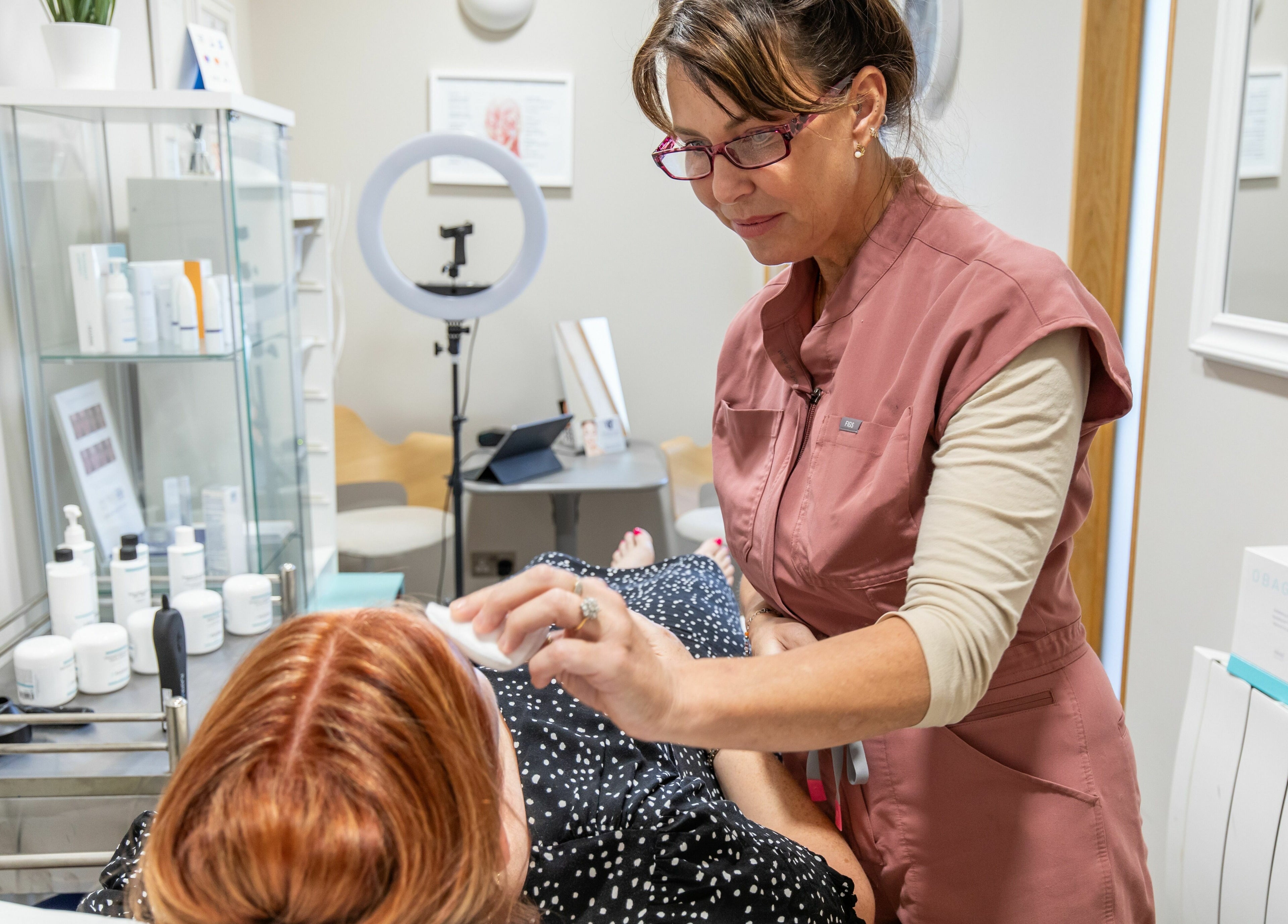 Frontalis Clinic staff providing skincare treatment in Portishead, England, GB.