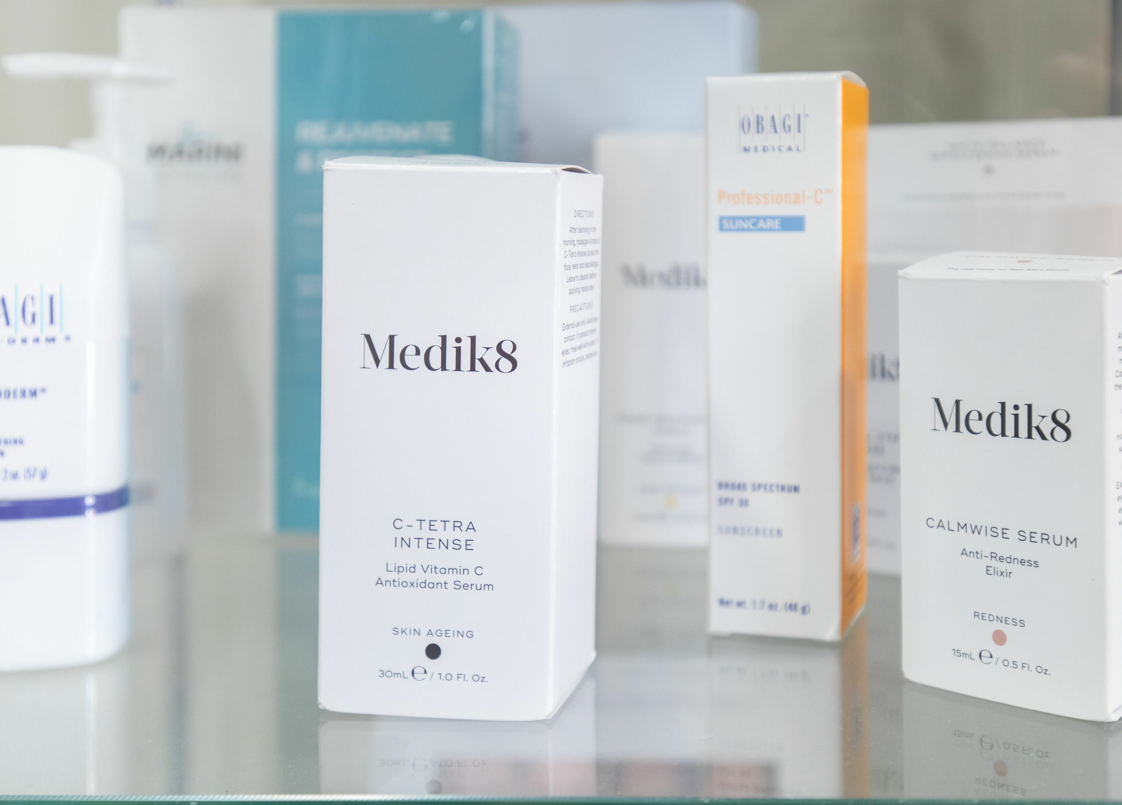 Display of Medik8 serums at Frontalis Clinic, Portishead, England, GB, showcasing premium skincare products.