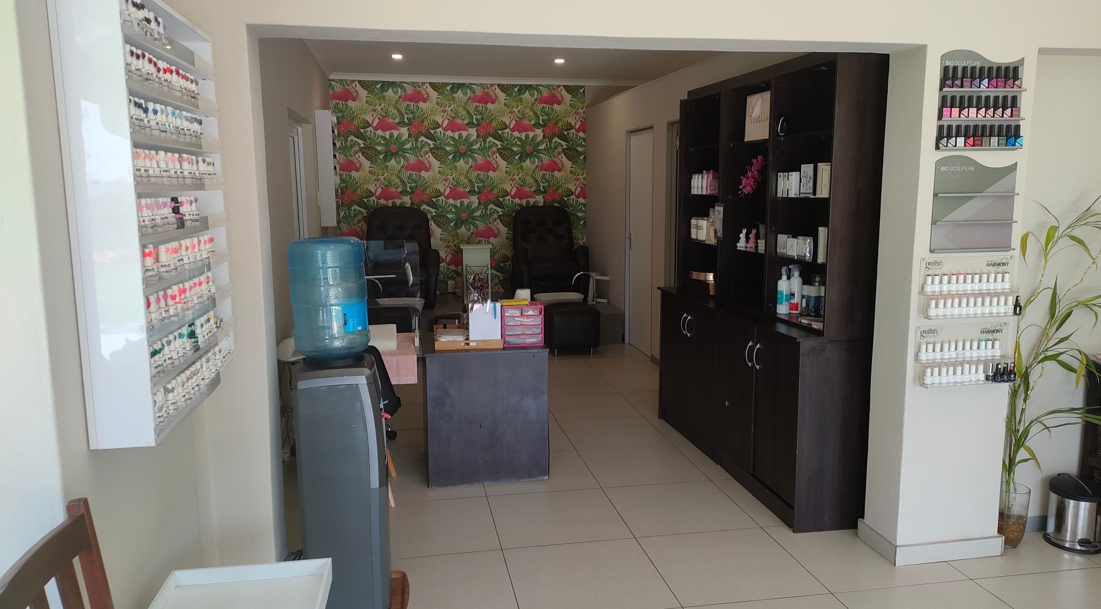 Pretty Posh Beauty in Krugersdorp, Gauteng, ZA showcasing a chic nail salon interior with vibrant decor.