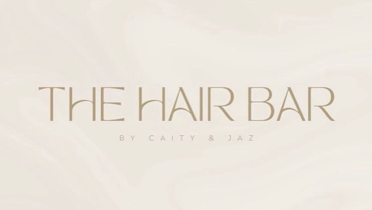 Beautiful Hair By Jasmin -The Hair Bar logo in soft beige at Wyoming, New South Wales, AU.