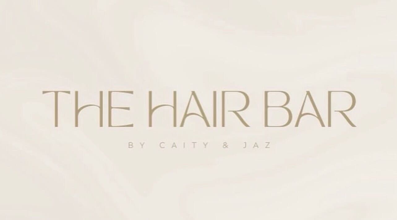 Beautiful Hair By Jasmin -The Hair Bar logo in soft beige at Wyoming, New South Wales, AU.