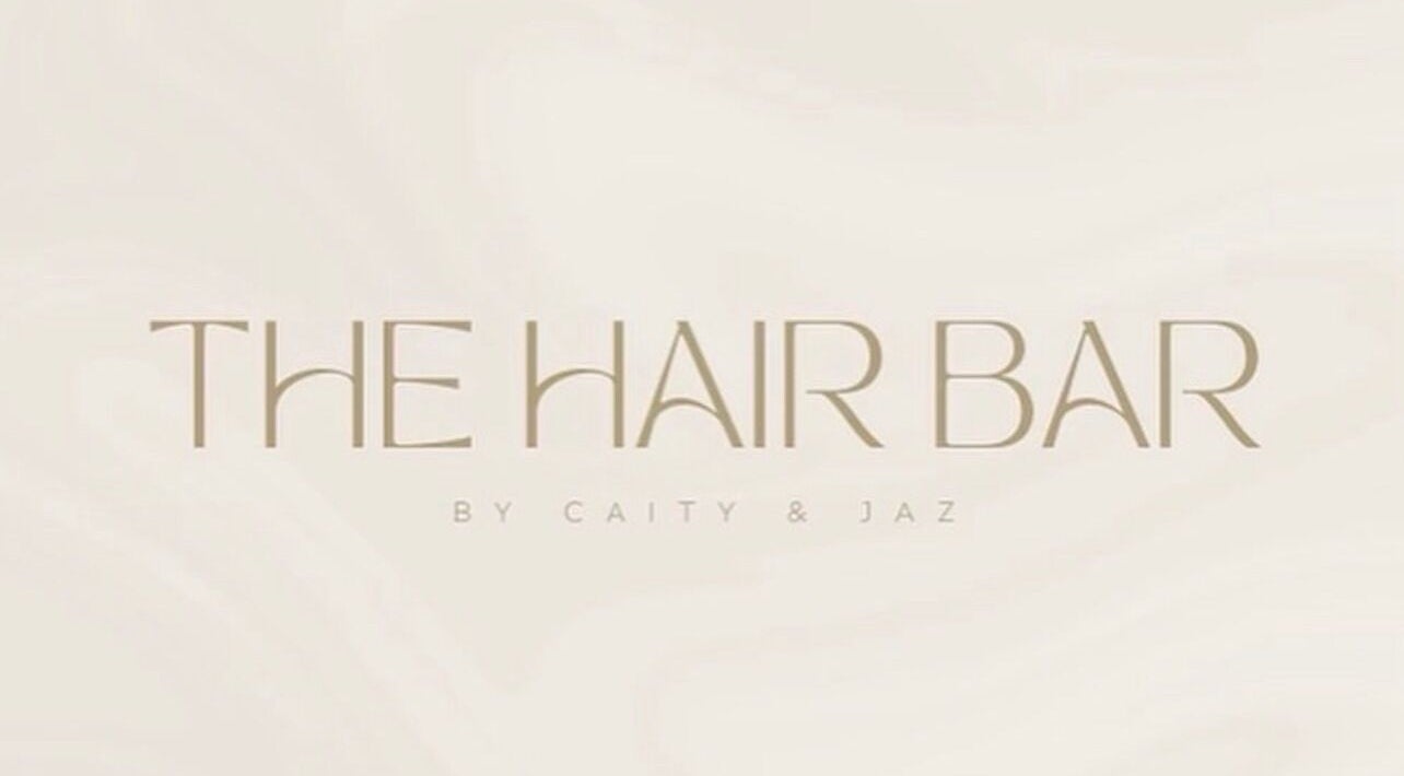 Beautiful Hair By Jasmin -The Hair Bar logo in soft beige at Wyoming, New South Wales, AU.