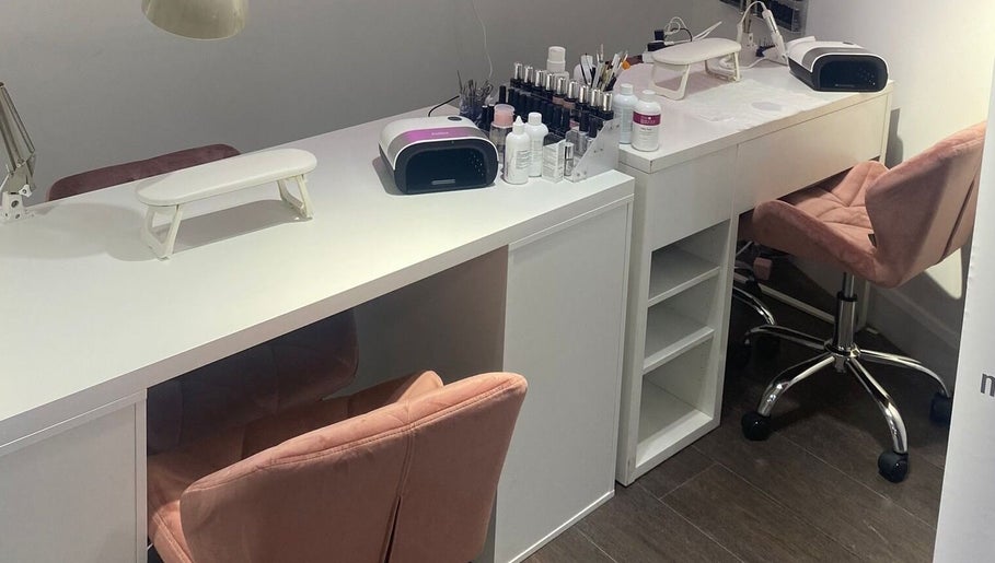 Chic nail station at MWM Beauty, County Mayo, IE, with modern tools and plush seating.