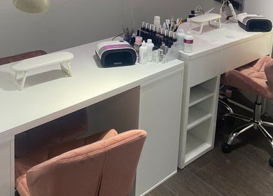 Chic nail station at MWM Beauty, County Mayo, IE, with modern tools and plush seating.