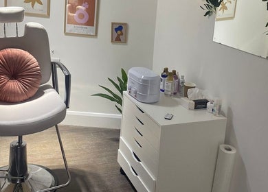 Cozy beauty treatment area at MWM Beauty, County Mayo, County Mayo, IE with a plush chair and modern decor.