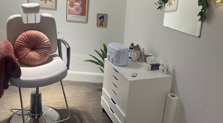 Cozy beauty treatment area at MWM Beauty, County Mayo, County Mayo, IE with a plush chair and modern decor.