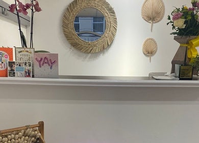 MWM Beauty reception in County Mayo with decorative cards and flowers creating a welcoming atmosphere.