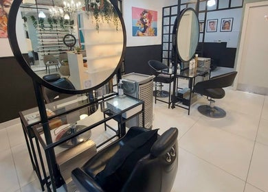 Elegant styling stations at Polish Nails Care & More Salon in Abu Dhabi, AE showcasing modern design.