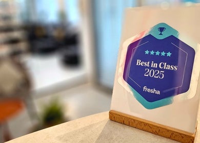 Award displayed at Polish Nails Care & More Salon, Abu Dhabi, AE, highlighting 'Best in Class 2025'.