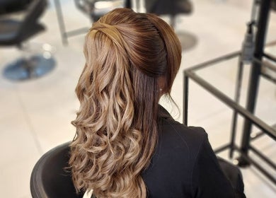 Elegant hairstyle at Polish Nails Care & More Salon, Abu Dhabi, AE.
