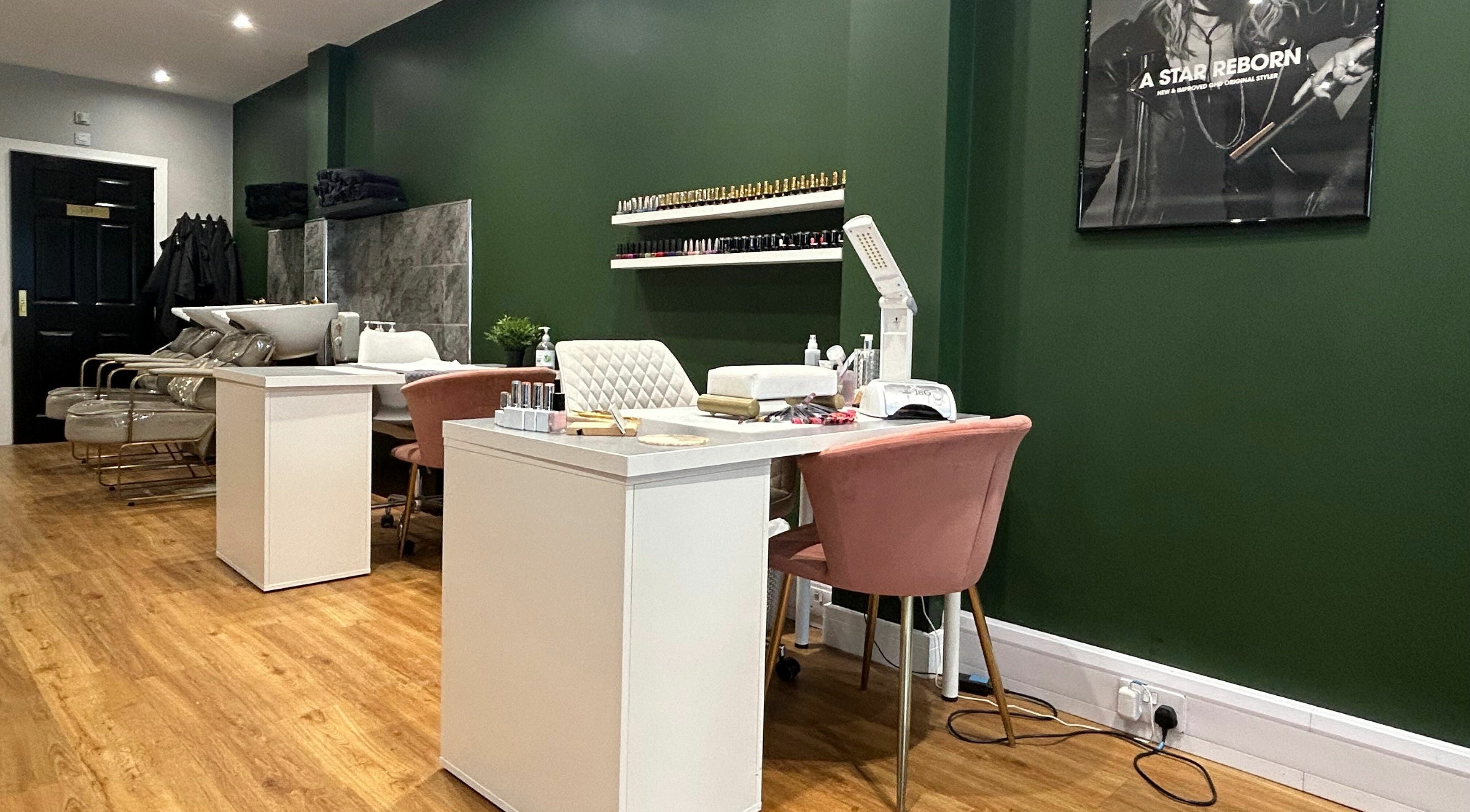Stylish interior of K Collective Hair and Beauty, featuring modern salon chairs in Doncaster, England, GB.