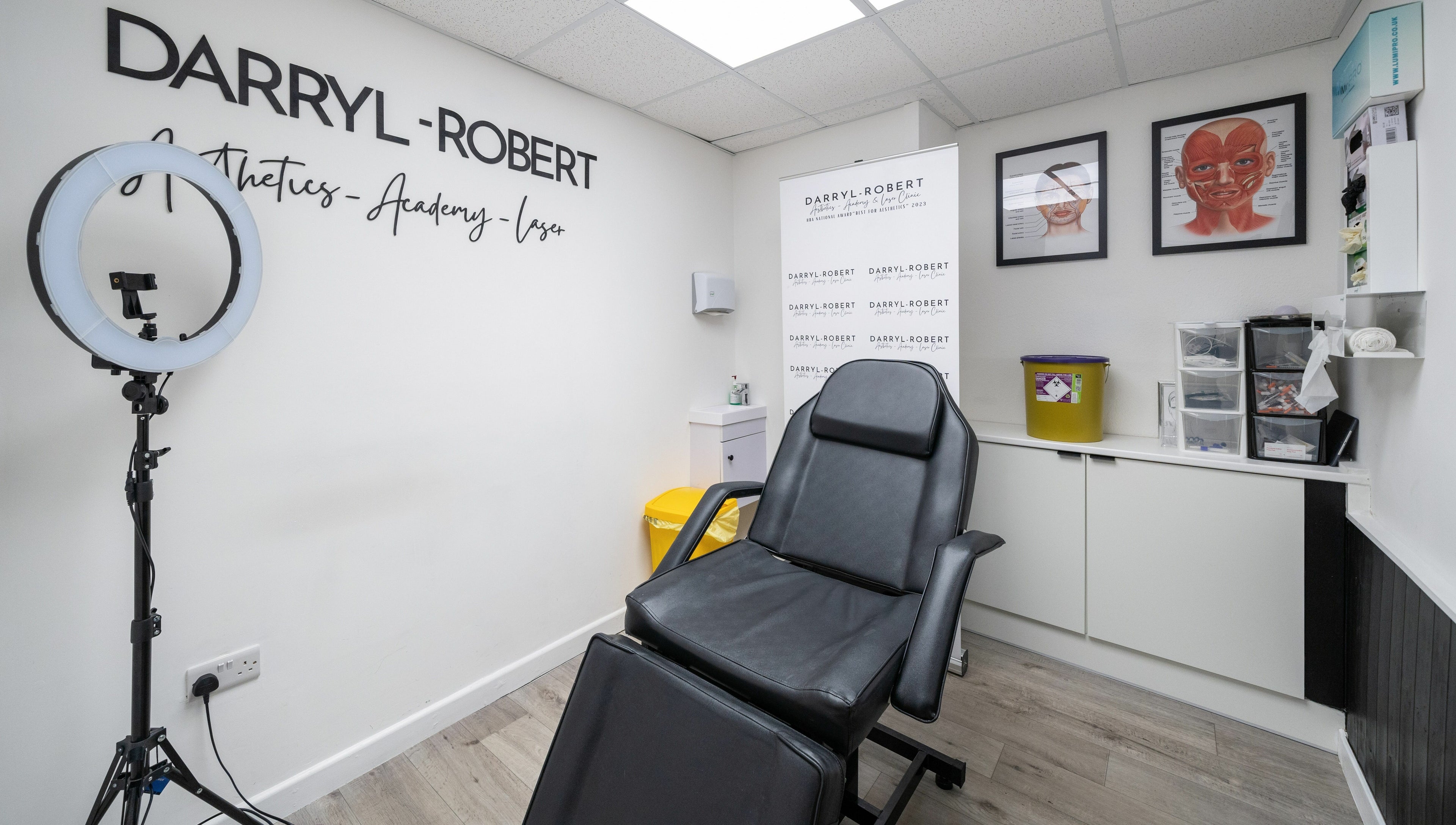 DRA Honiton HQ in Honiton, England, GB, featuring a modern treatment room with aesthetic decor and professional equipment.