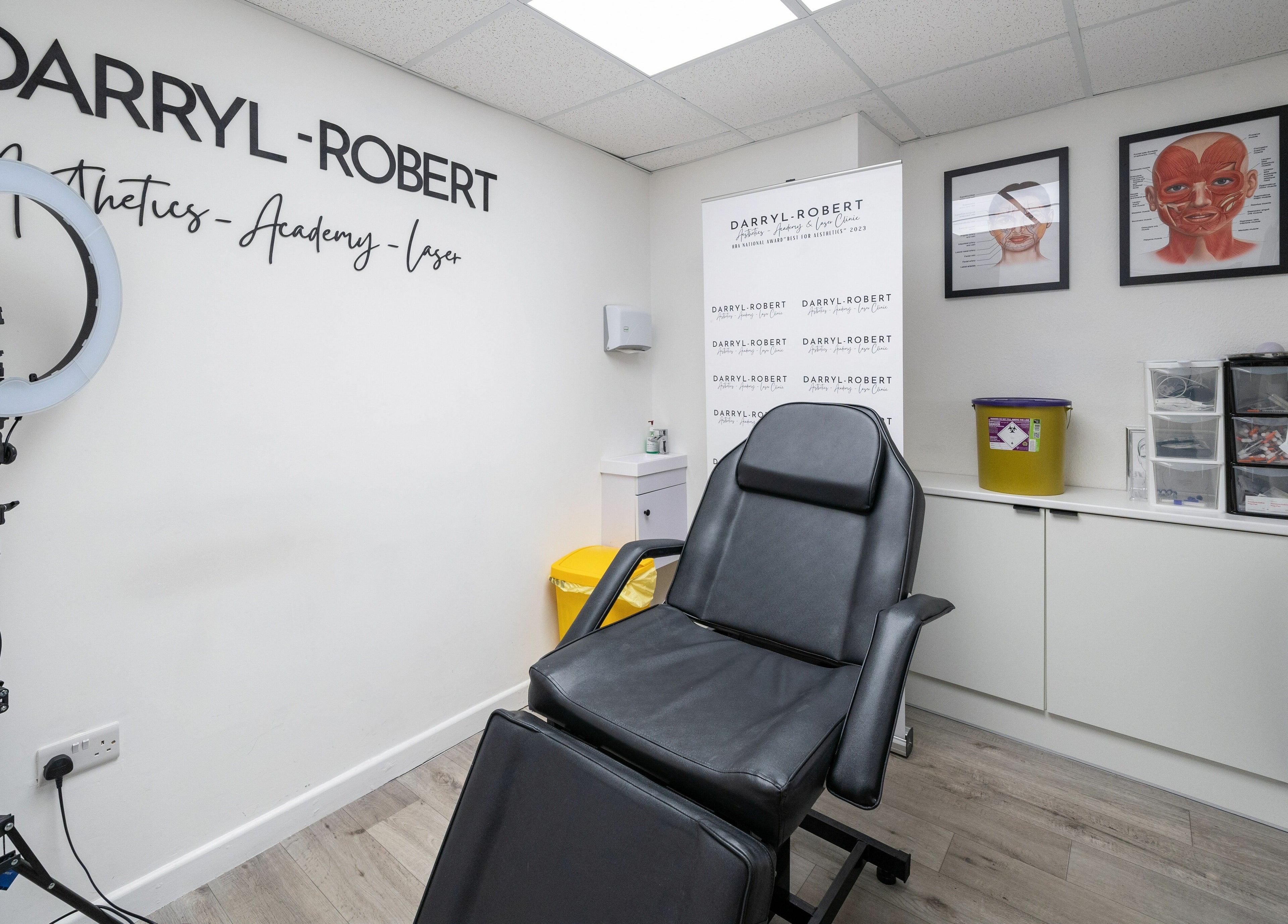 DRA Honiton HQ in Honiton, England, GB, featuring a modern treatment room with aesthetic decor and professional equipment.
