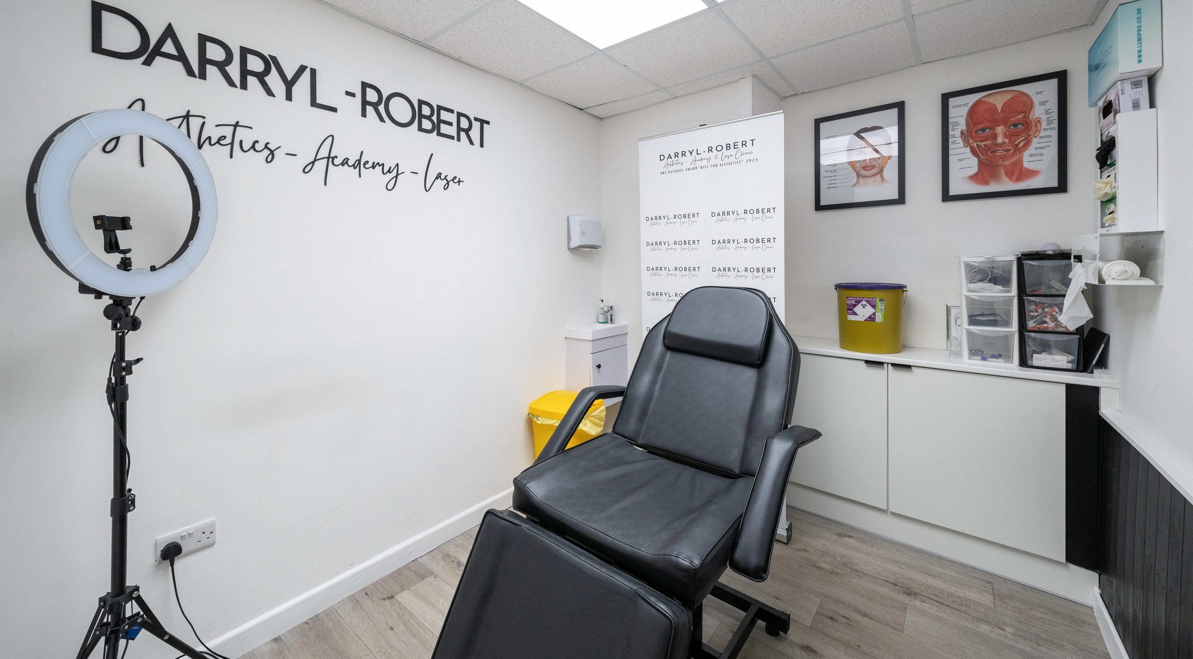 DRA Honiton HQ in Honiton, England, GB, featuring a modern treatment room with aesthetic decor and professional equipment.