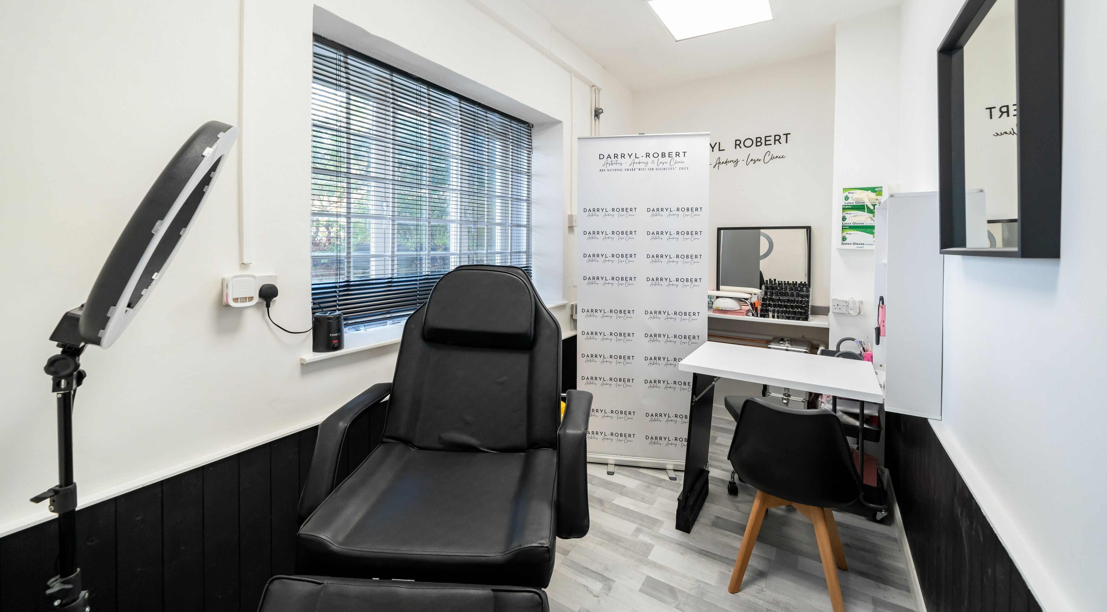 Modern treatment room at DRA Honiton HQ, Honiton, England, GB, featuring stylish decor and comfortable seating.