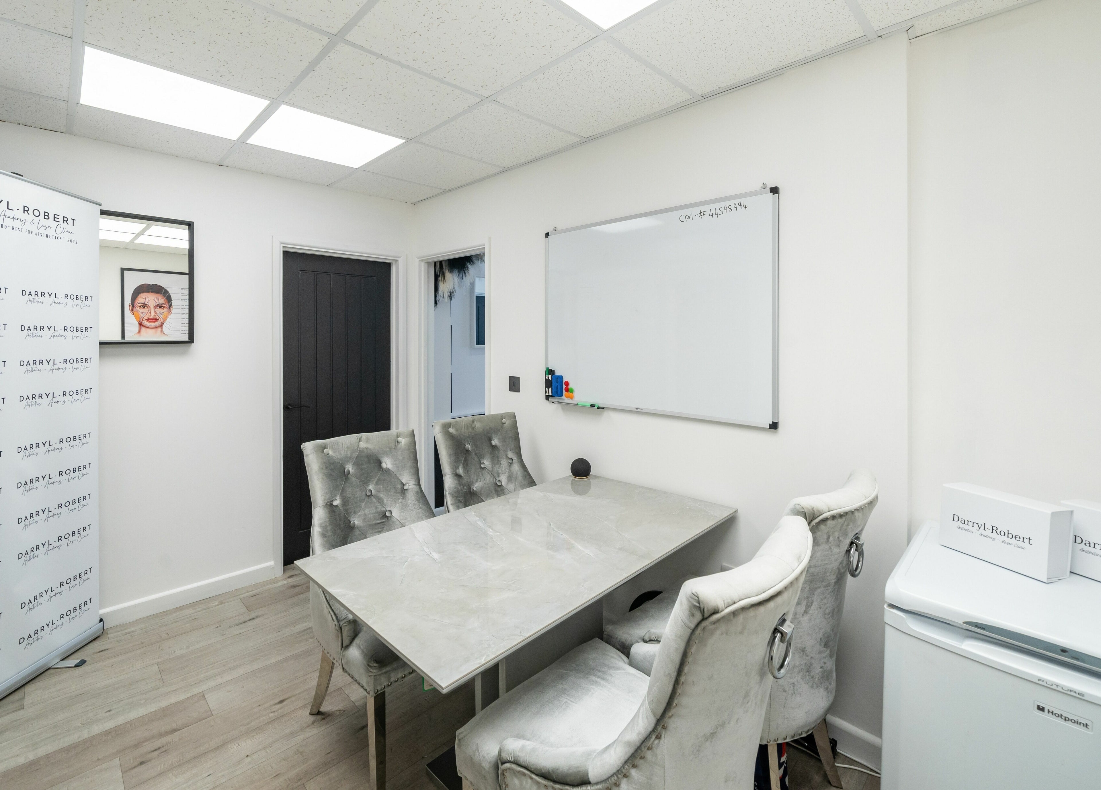 Stylish meeting room at DRA Honiton HQ, Honiton, England, GB with plush chairs and elegant decor.