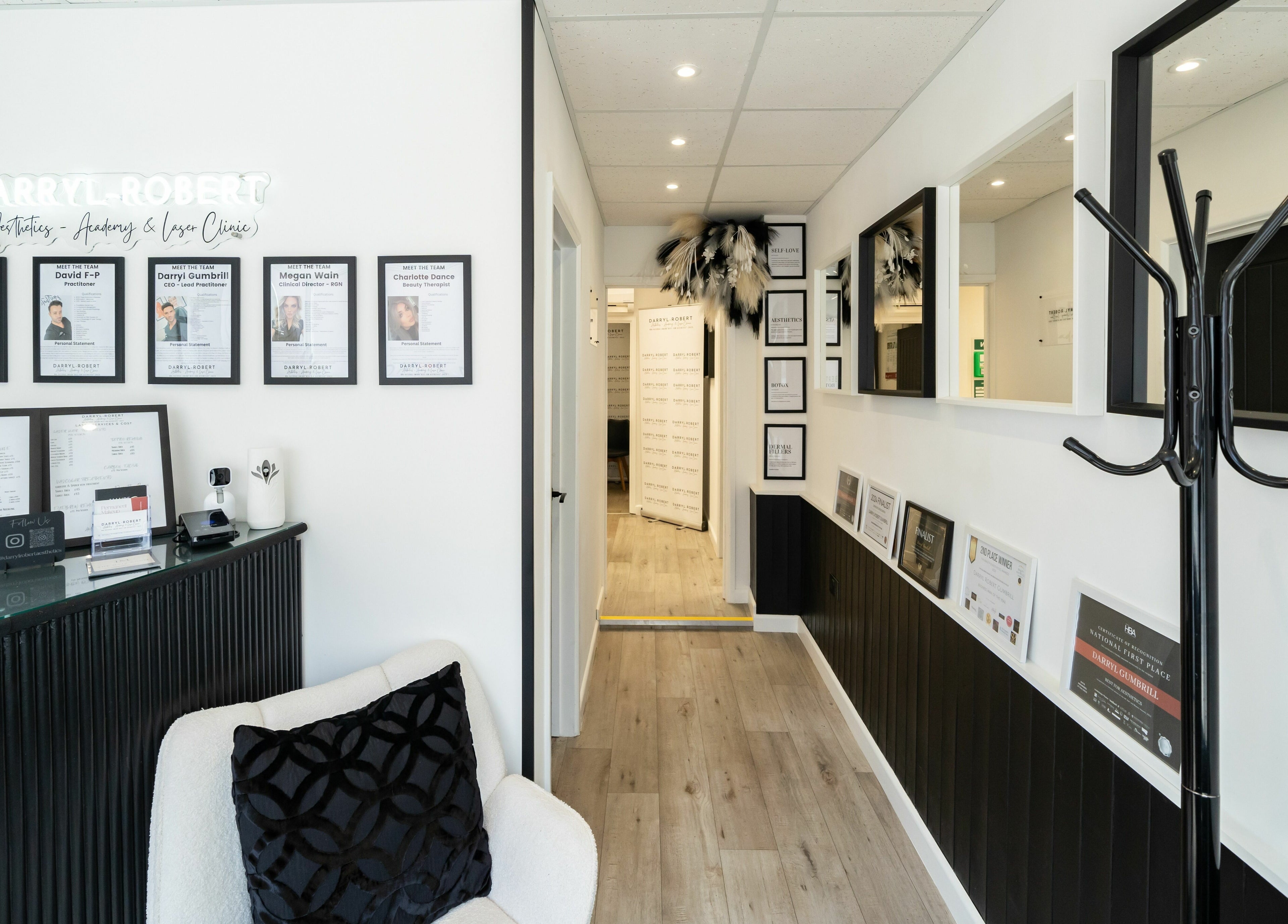 Reception area at DRA Honiton HQ with framed accolades and chic decor in Honiton, England, GB.