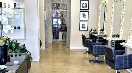 Interior of Allure Hair and Co - By Christina, Coburg, Victoria, AU highlighting stylish salon chairs and mirrors.