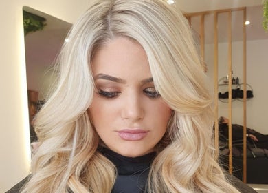 Blonde hair styled in soft waves at Allure Hair and Co - By Christina, Coburg, Victoria, AU.