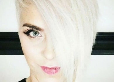 Stylish platinum blonde haircut at Allure Hair and Co - By Christina in Coburg, Victoria, AU.