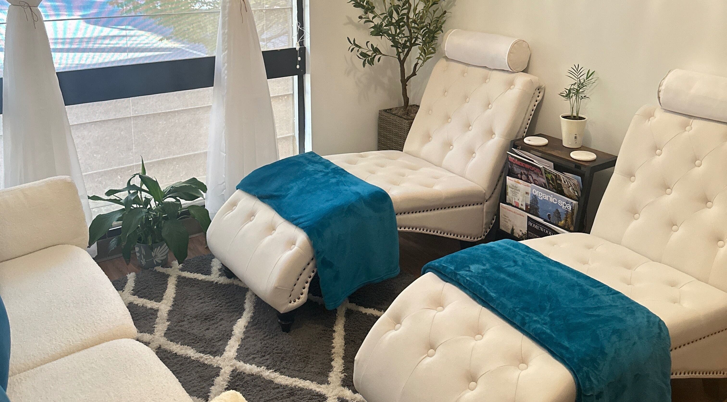 Cozy massage chairs at Aphros Beauty, Homewood, Alabama, US offering a serene wellness experience.
