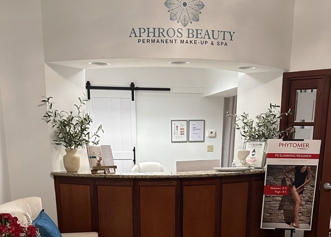 Reception area of Aphros Beauty in Homewood, Alabama, US with elegant decor and welcoming vibe.