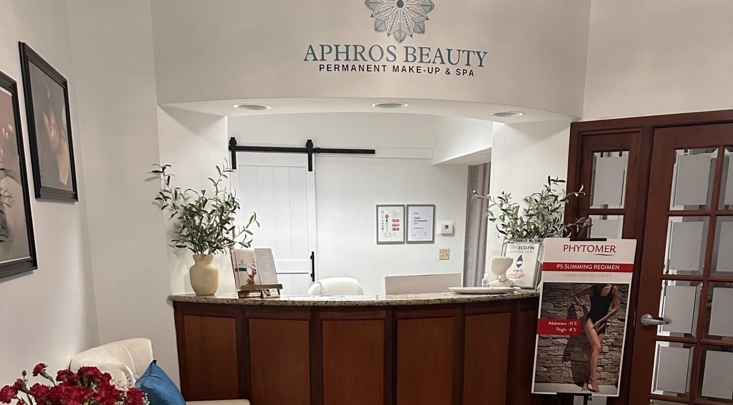 Reception area of Aphros Beauty in Homewood, Alabama, US with elegant decor and welcoming vibe.
