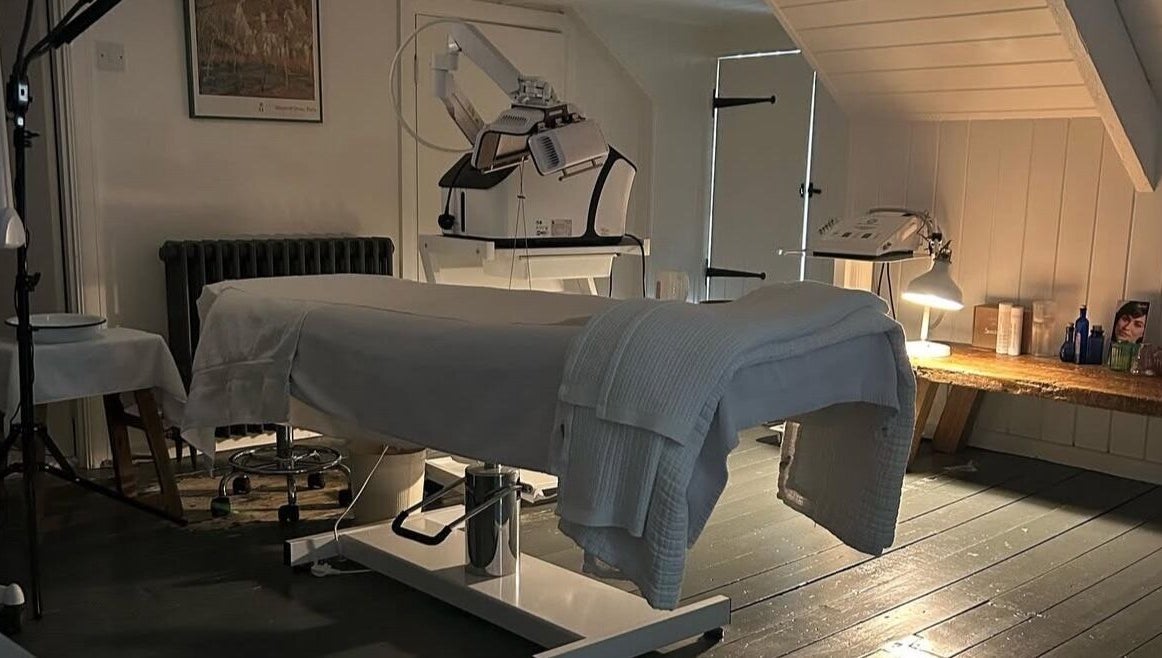 Relaxing treatment room at Sarah Nicolson Facialist in Ewenny, GB, featuring a therapeutic setup.