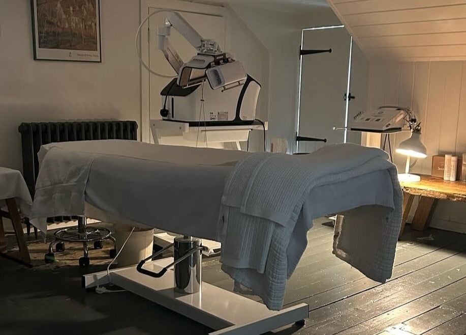 Relaxing treatment room at Sarah Nicolson Facialist in Ewenny, GB, featuring a therapeutic setup.
