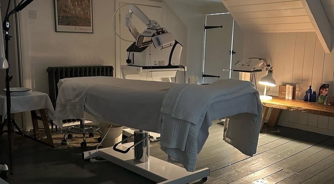 Relaxing treatment room at Sarah Nicolson Facialist in Ewenny, GB, featuring a therapeutic setup.